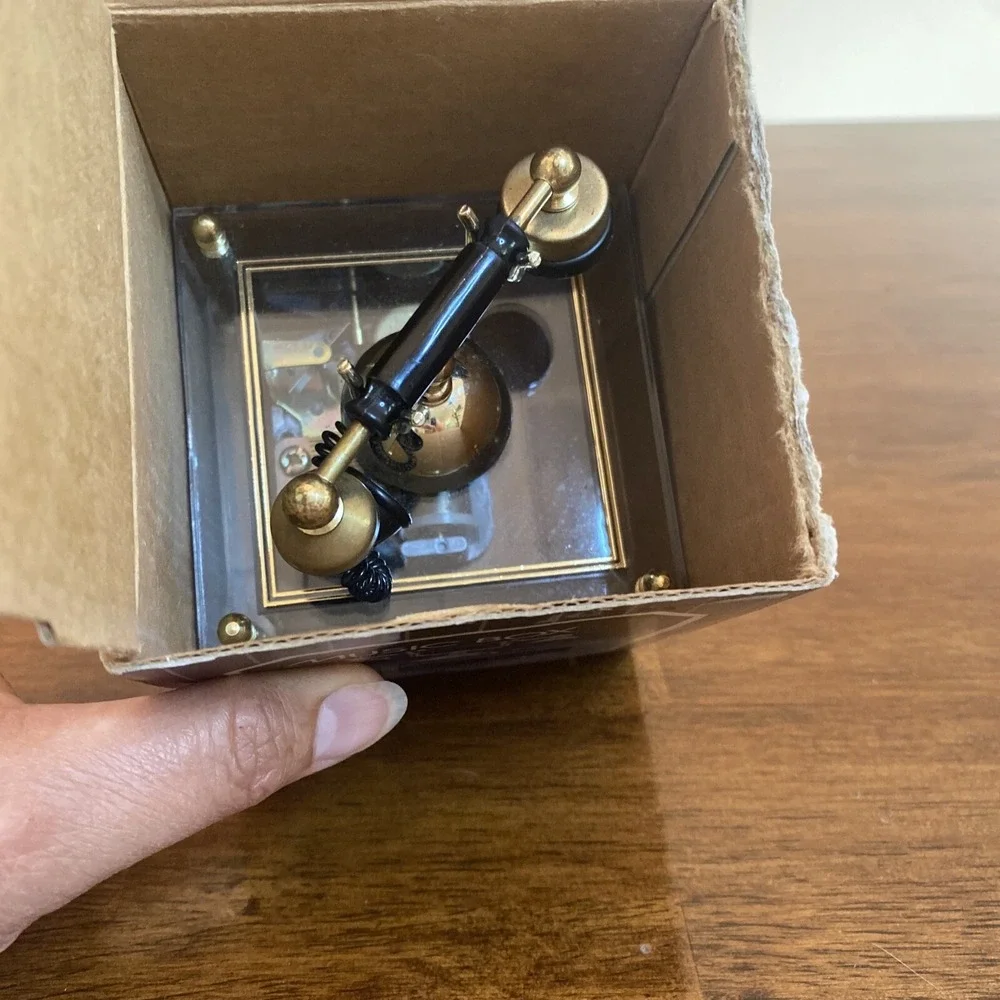 Musical Revolving Telephone With Gold Accents Song (Fillings)